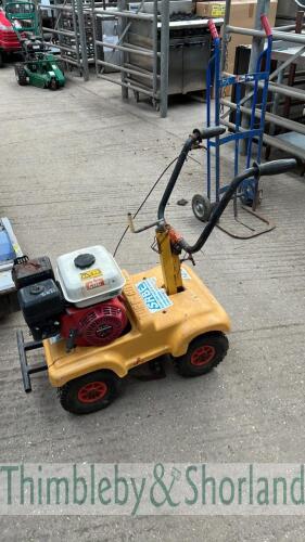 Petrol turf cutter