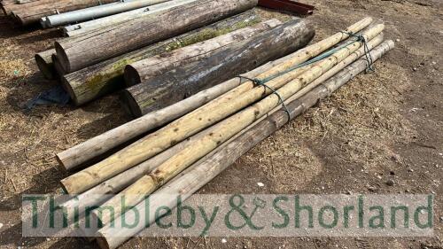 9 wooden poles approx 12ft