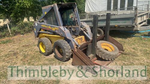 New Holland LS160 skidsteer with bucket, bale spike, spare wheel