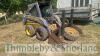 New Holland LS160 skidsteer with bucket, bale spike, spare wheel