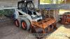 Bobcat 741 skidsteer loader with bucket and Whites dung grab plus extra bucket