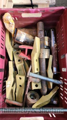 Tray of bucket pins and teeth