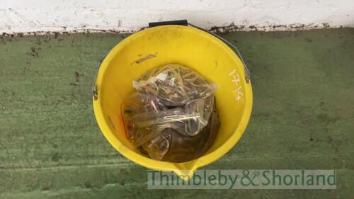 Bucket of pins and clips