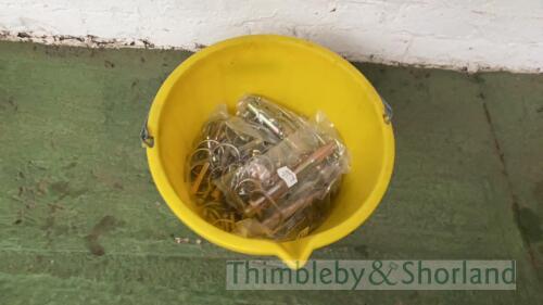 Bucket of pins and clips