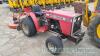 Massey Ferguson 1010 compact tractor with topper