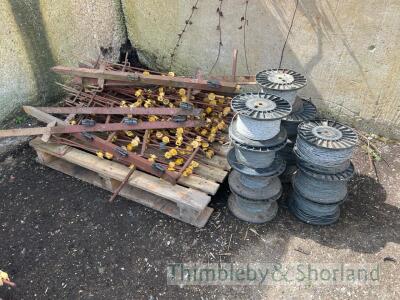 Approx 100 metal electric fencing stakes, 6 straining posts, 11 reel of wire