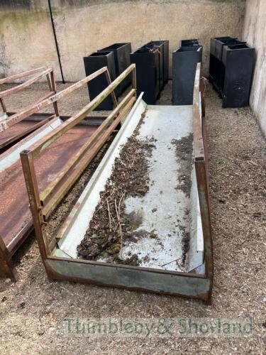 Feed barrier trough with spare galvanised insert