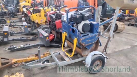 Vibrol pedestrian roller and trailer