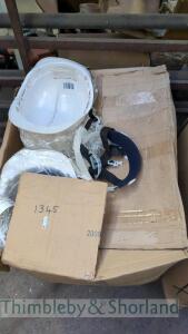 Quantity of white hard hats