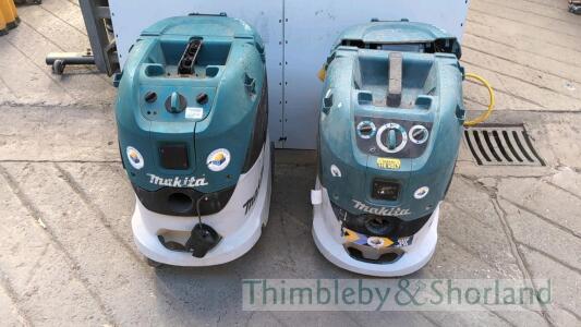 2 Makita vacuums