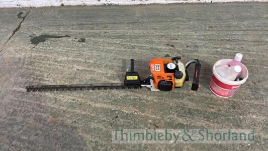 Stihl HS 85 hedge cutter with oil and mixing bottle