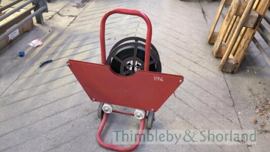 Metal banding trolley and reel of strapping