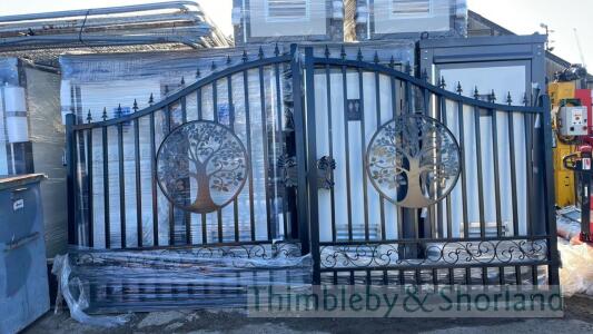 Pair of driveway gates, New and unused each gate 7ft wide, height 71 to 89 inches